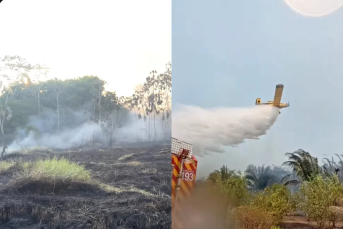 Bombeiros combatem incêndio em Iranduba, em área de vegetação próxima a imóveis.